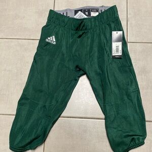 Dark green, Adidas youth large football pants, 7 pocket pants, new with tags.